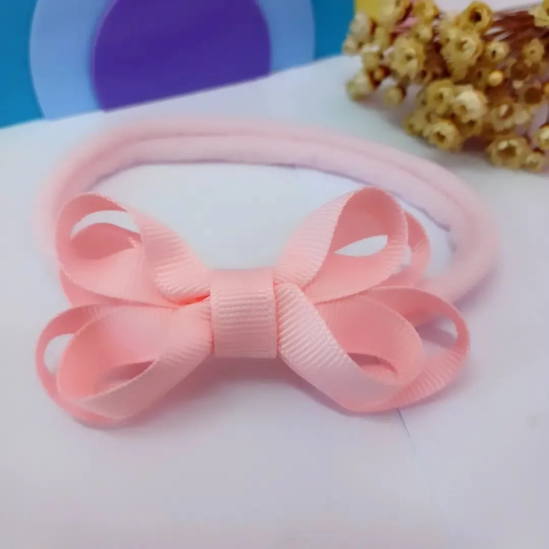 Faixinha laço boutique duplo